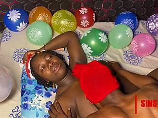 Christmas time is a time for sin and pleasure and this is a big cocked black man fucking a woman with big tits while she is giving a massage with oil with her back towards him